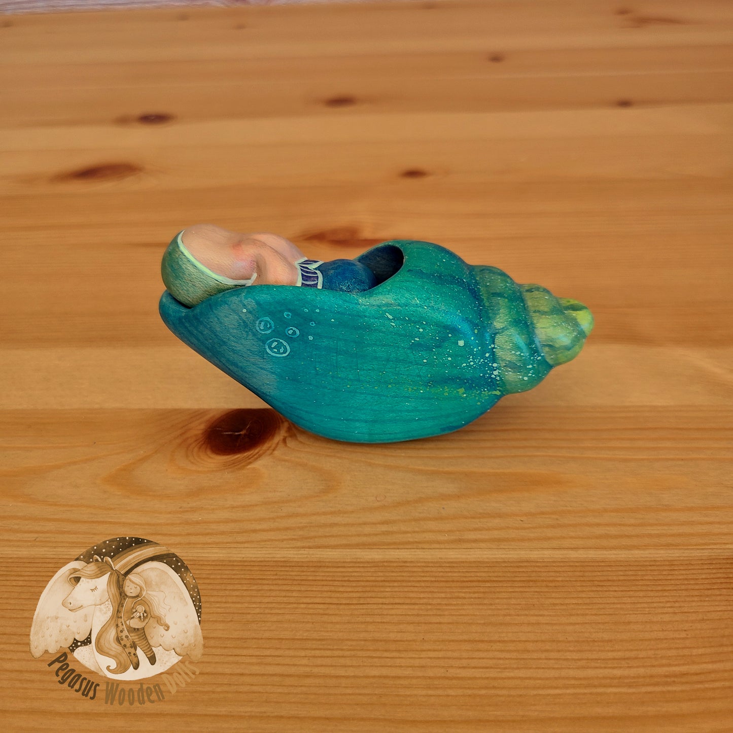 Wooden Blue Conch Shell with green merbaby