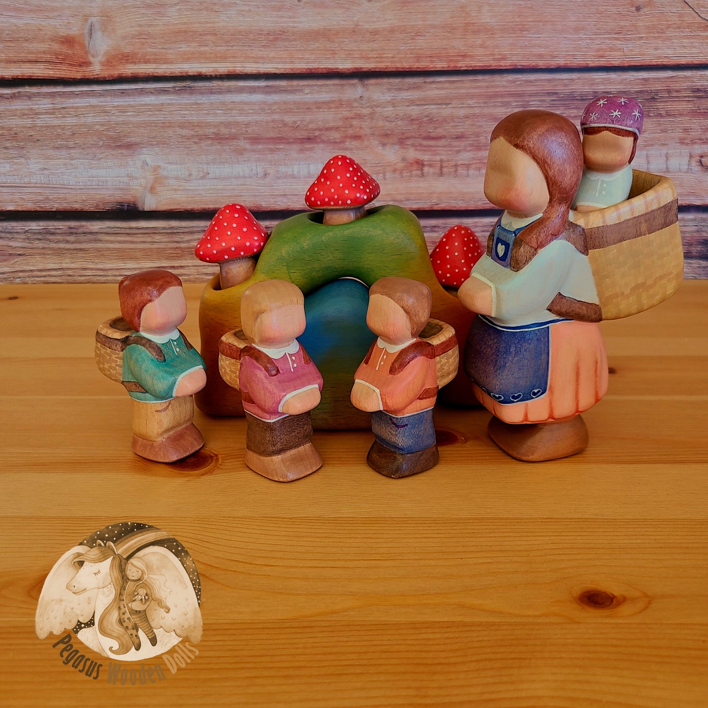 Wooden Standing Baby with basket (mauve shirt)