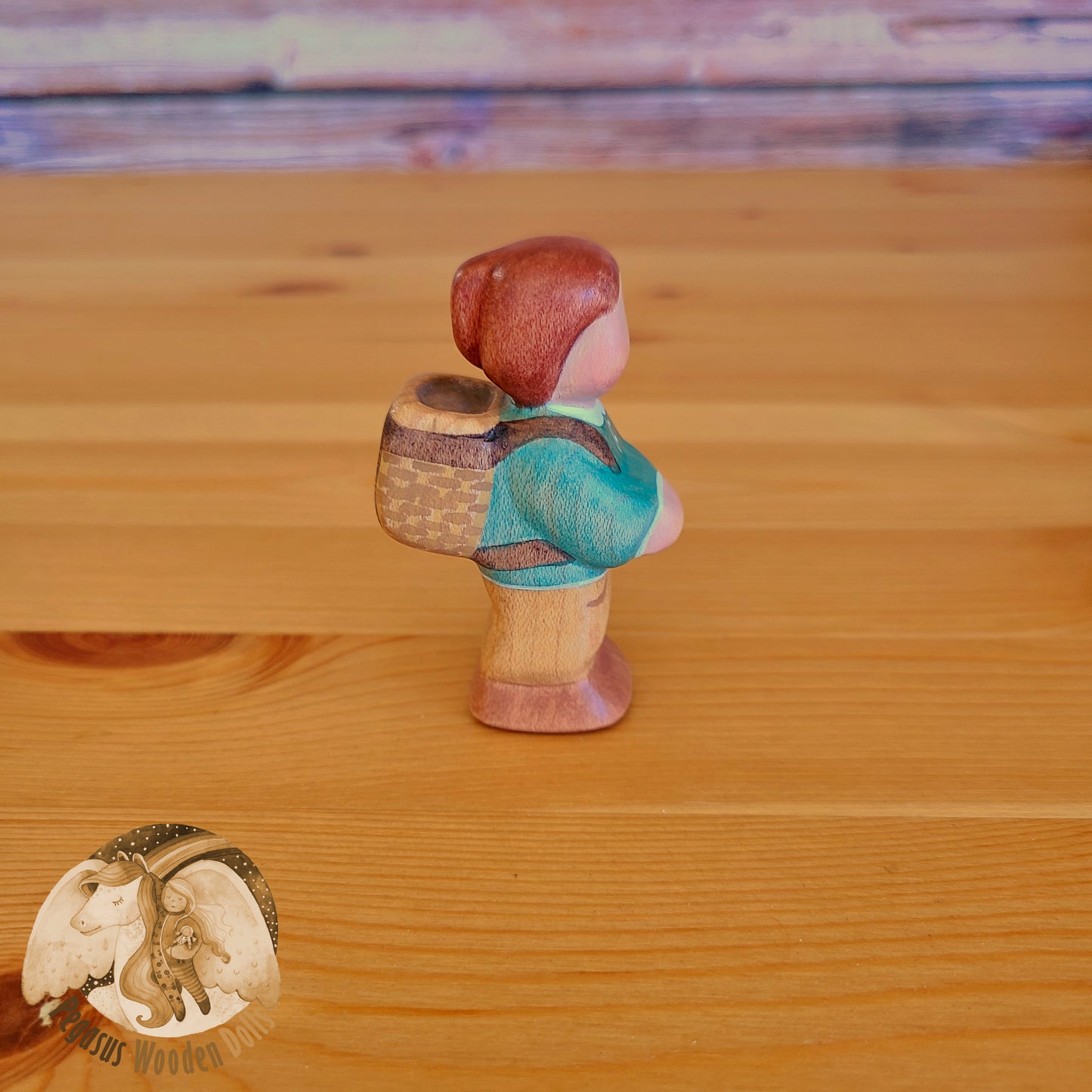 Wooden Standing Baby with basket (green shirt)