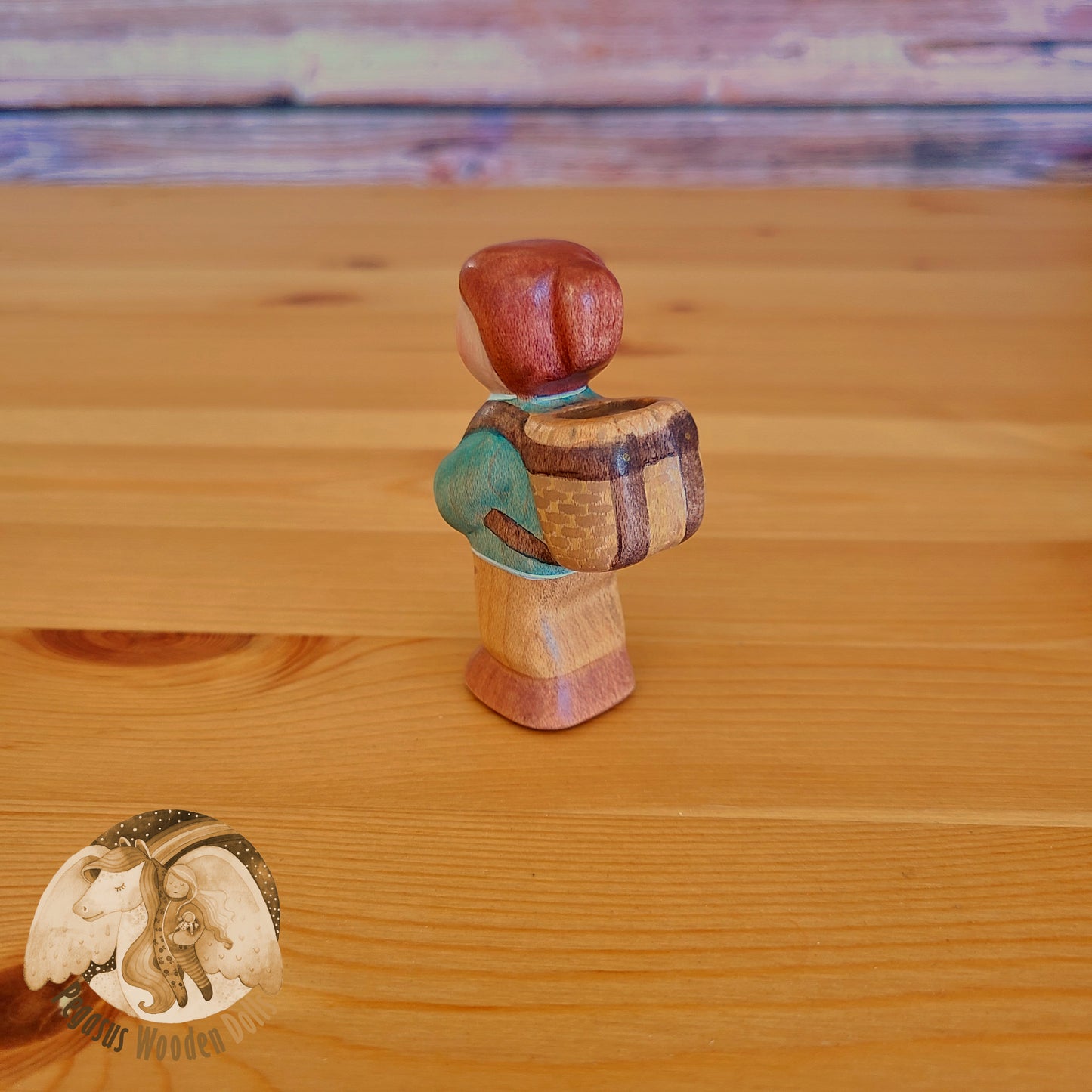 Wooden Standing Baby with basket (green shirt)