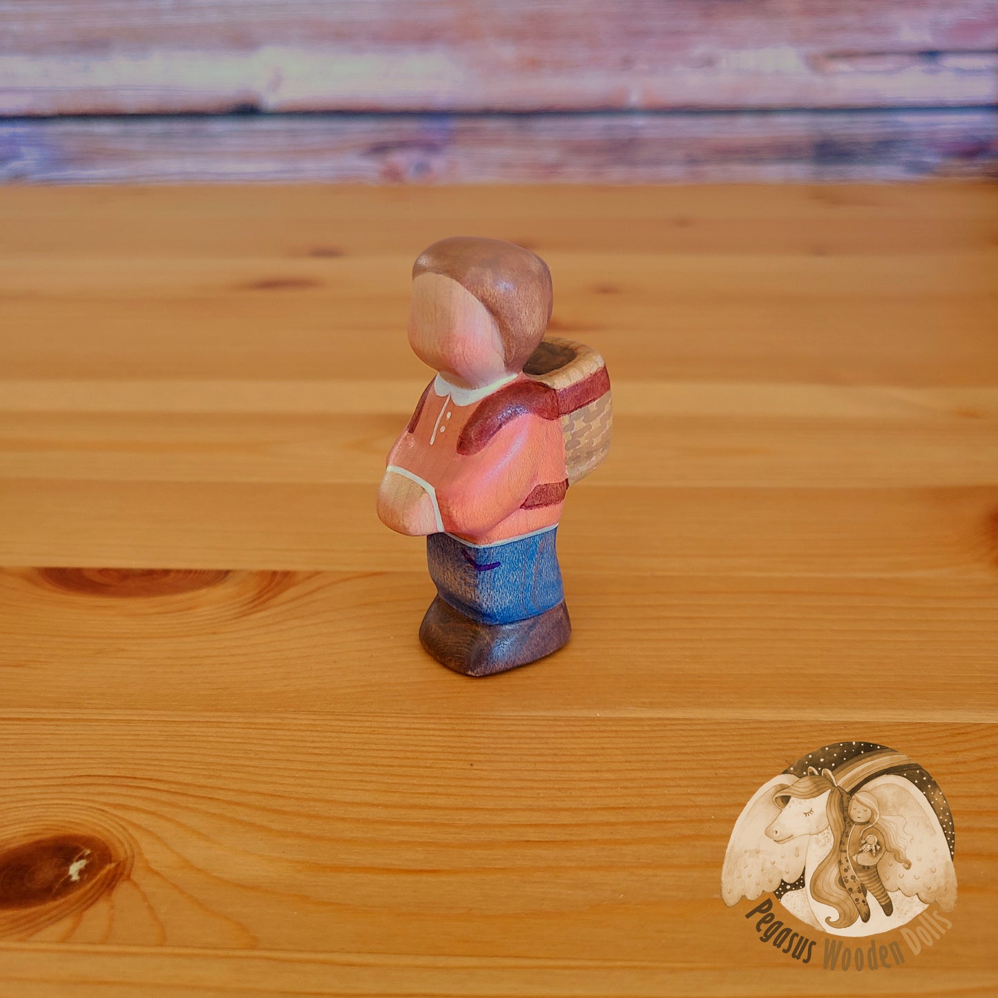 Wooden Standing Baby with basket (orange shirt)