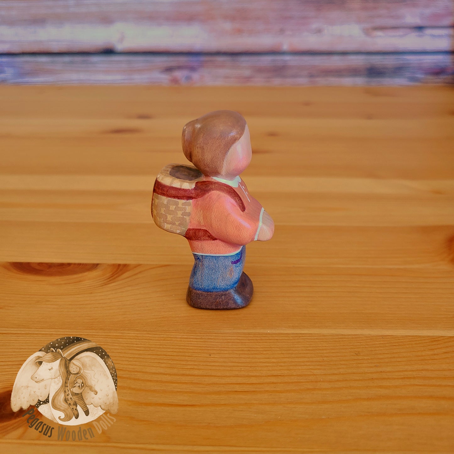 Wooden Standing Baby with basket (orange shirt)