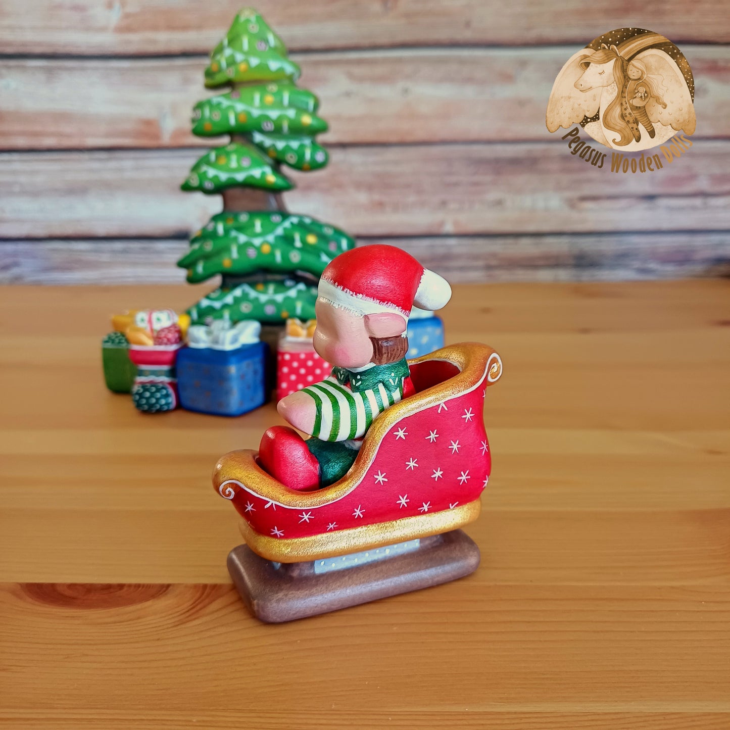 Wooden Winter Sitting Elf Baby in slide (brown hair)