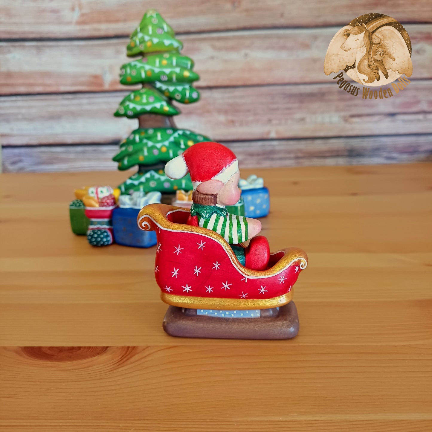 Wooden Winter Sitting Elf Baby in slide (brown hair)