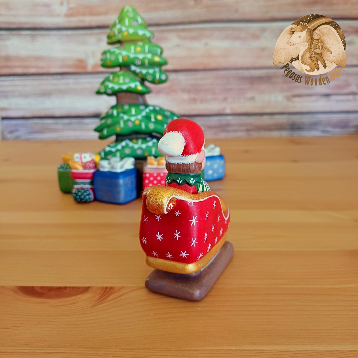 Wooden Winter Sitting Elf Baby in slide (brown hair)