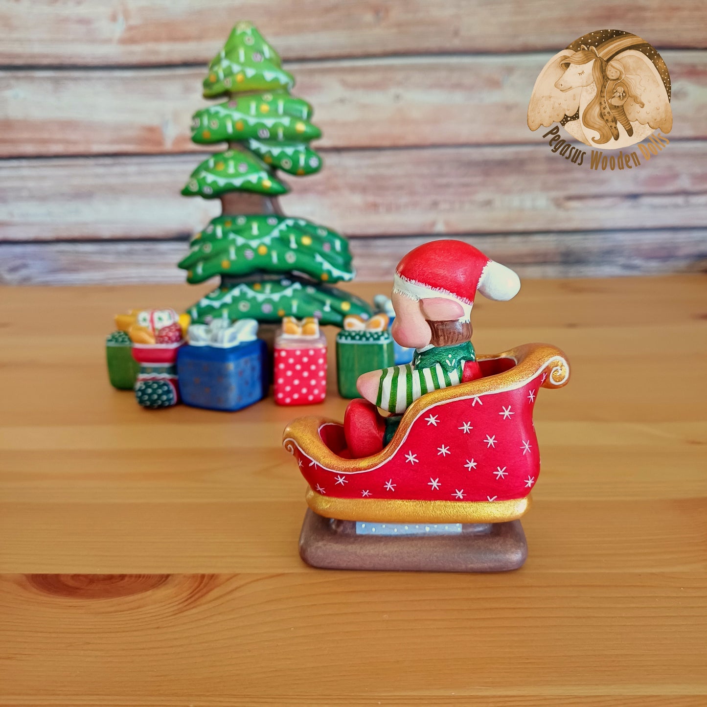 Wooden Winter Sitting Elf Baby in slide (brown hair)