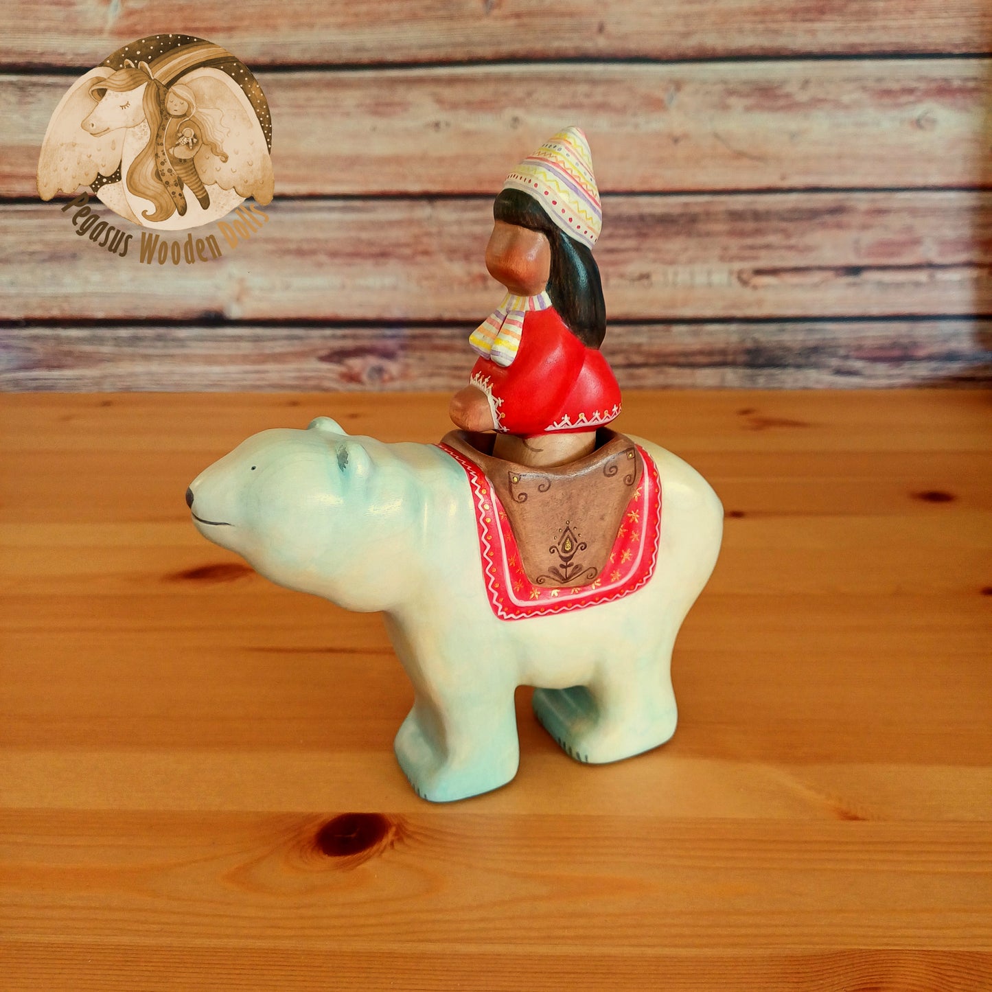 Wooden Polar Bear with rider (red)