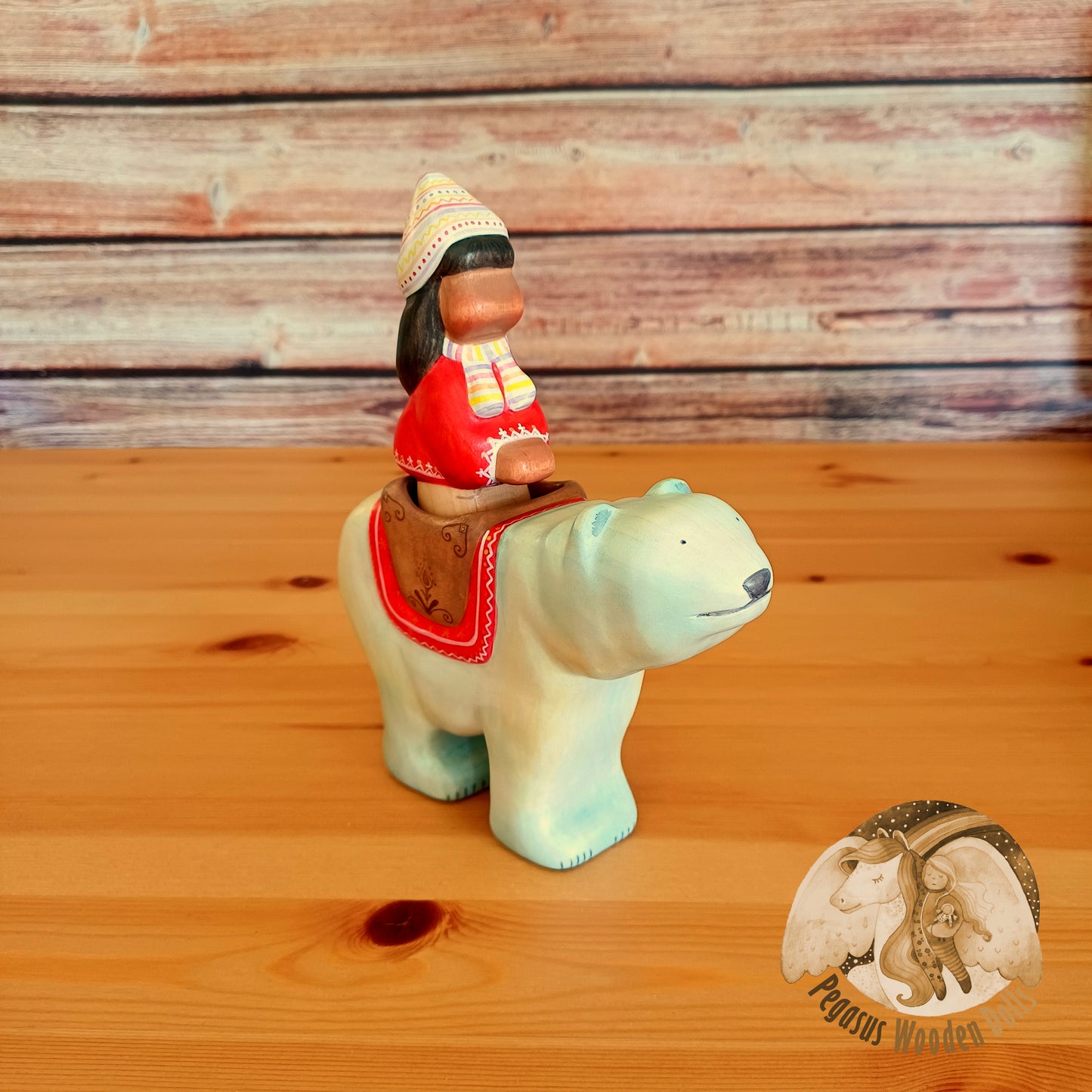 Wooden Polar Bear with rider (red)