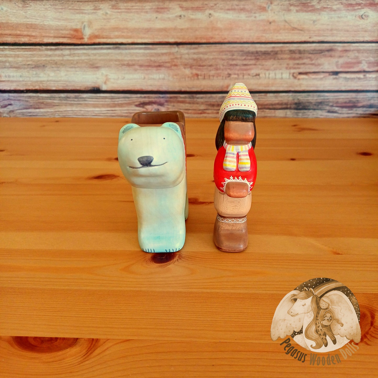 Wooden Polar Bear with rider (red)