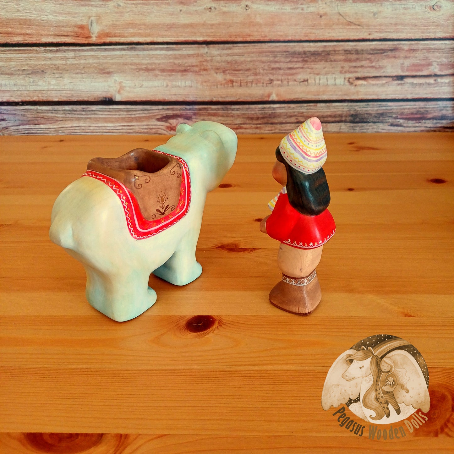 Wooden Polar Bear with rider (red)