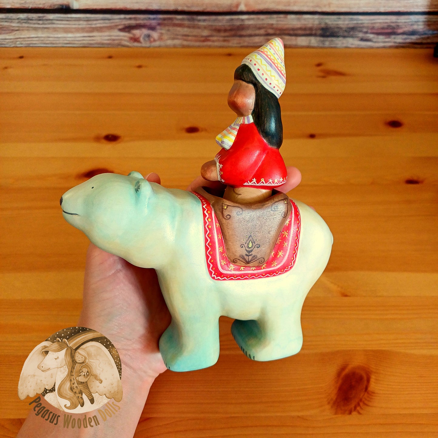 Wooden Polar Bear with rider (red)