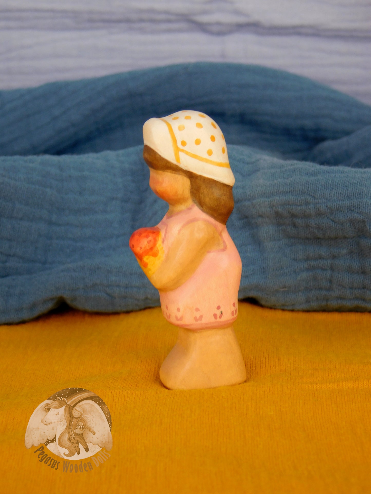 Wooden Standing Baby in pink pants with ice-cream