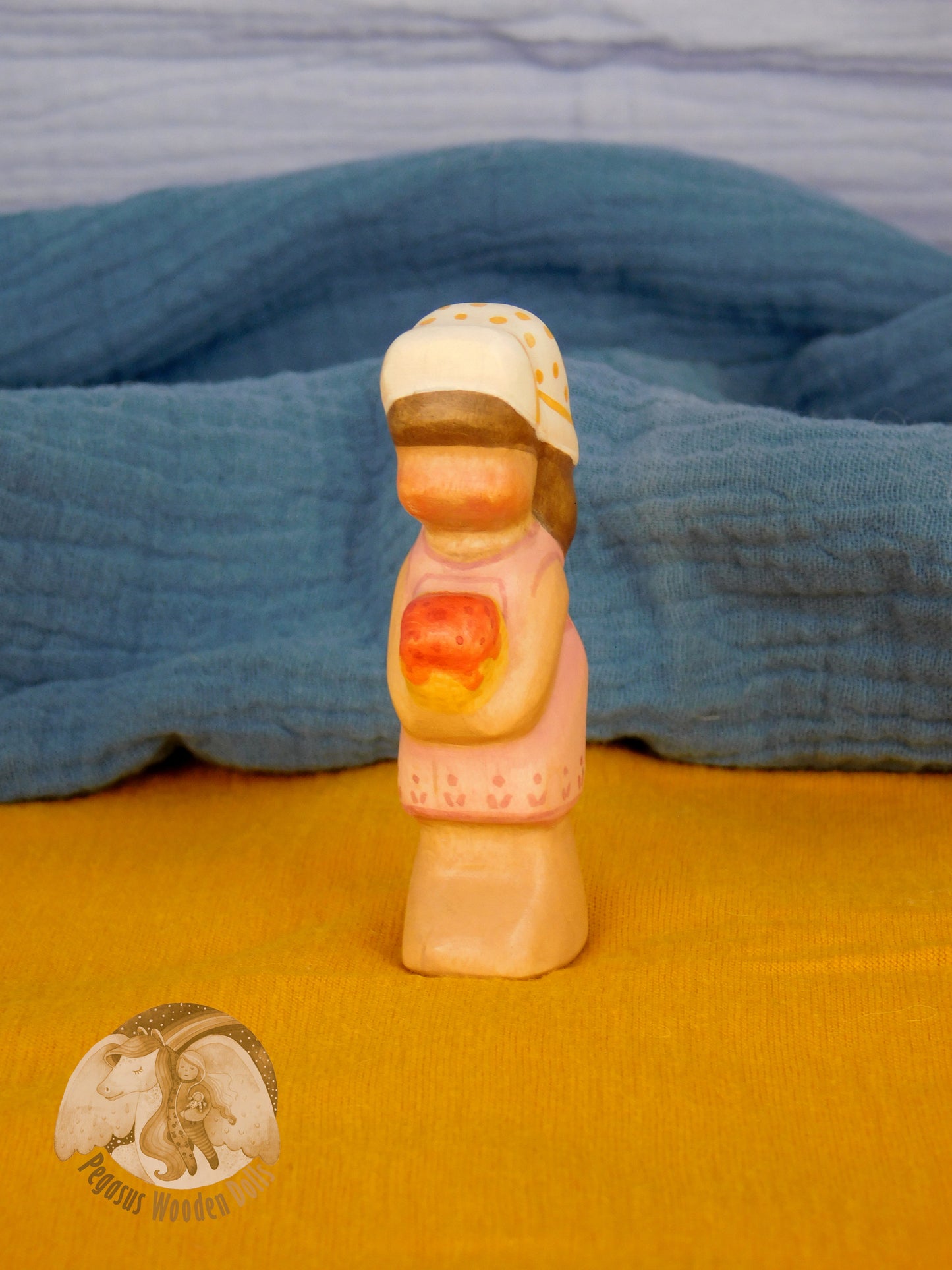 Wooden Standing Baby in pink pants with ice-cream