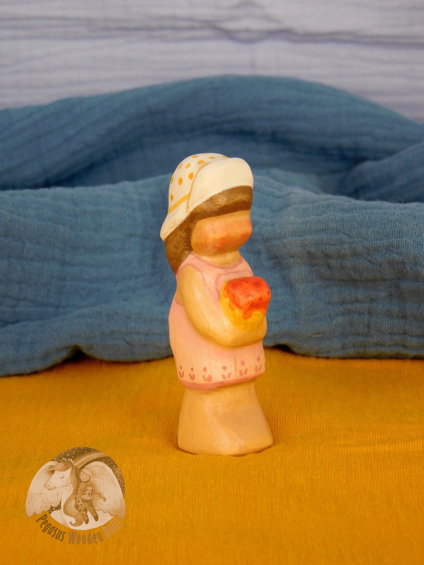 Wooden Standing Baby in pink pants with ice-cream