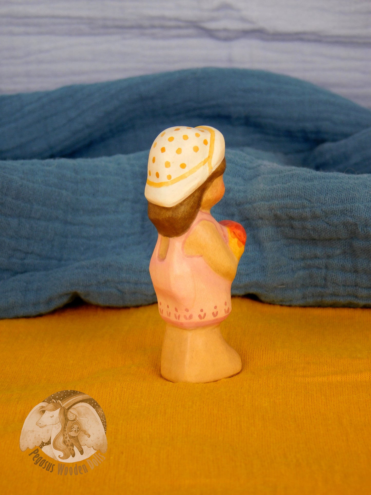 Wooden Standing Baby in pink pants with ice-cream