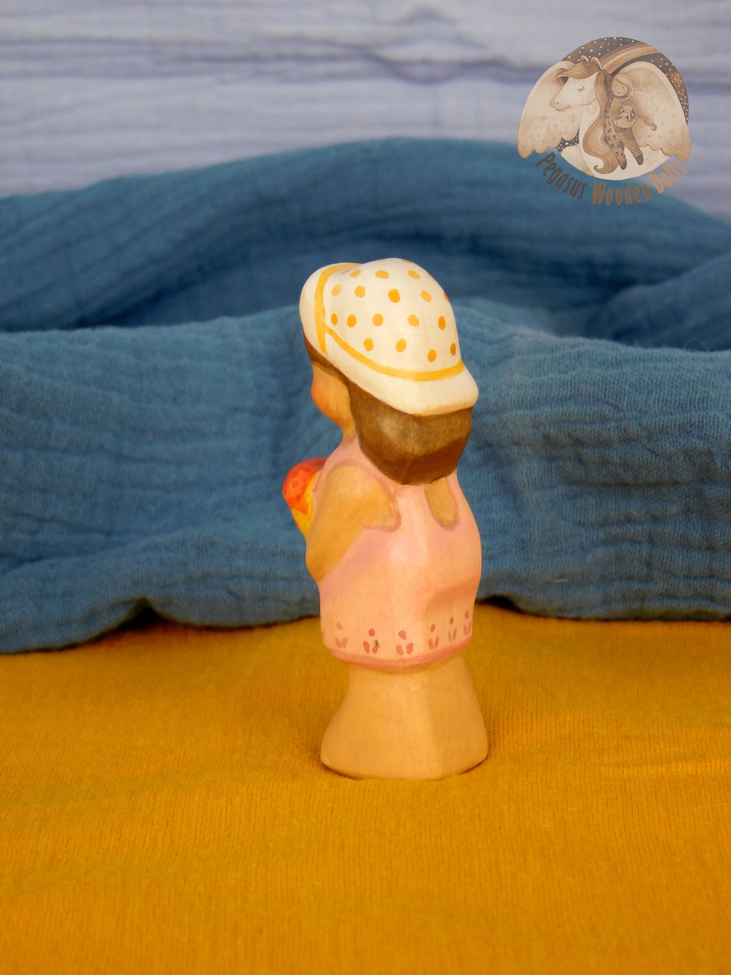 Wooden Standing Baby in pink pants with ice-cream