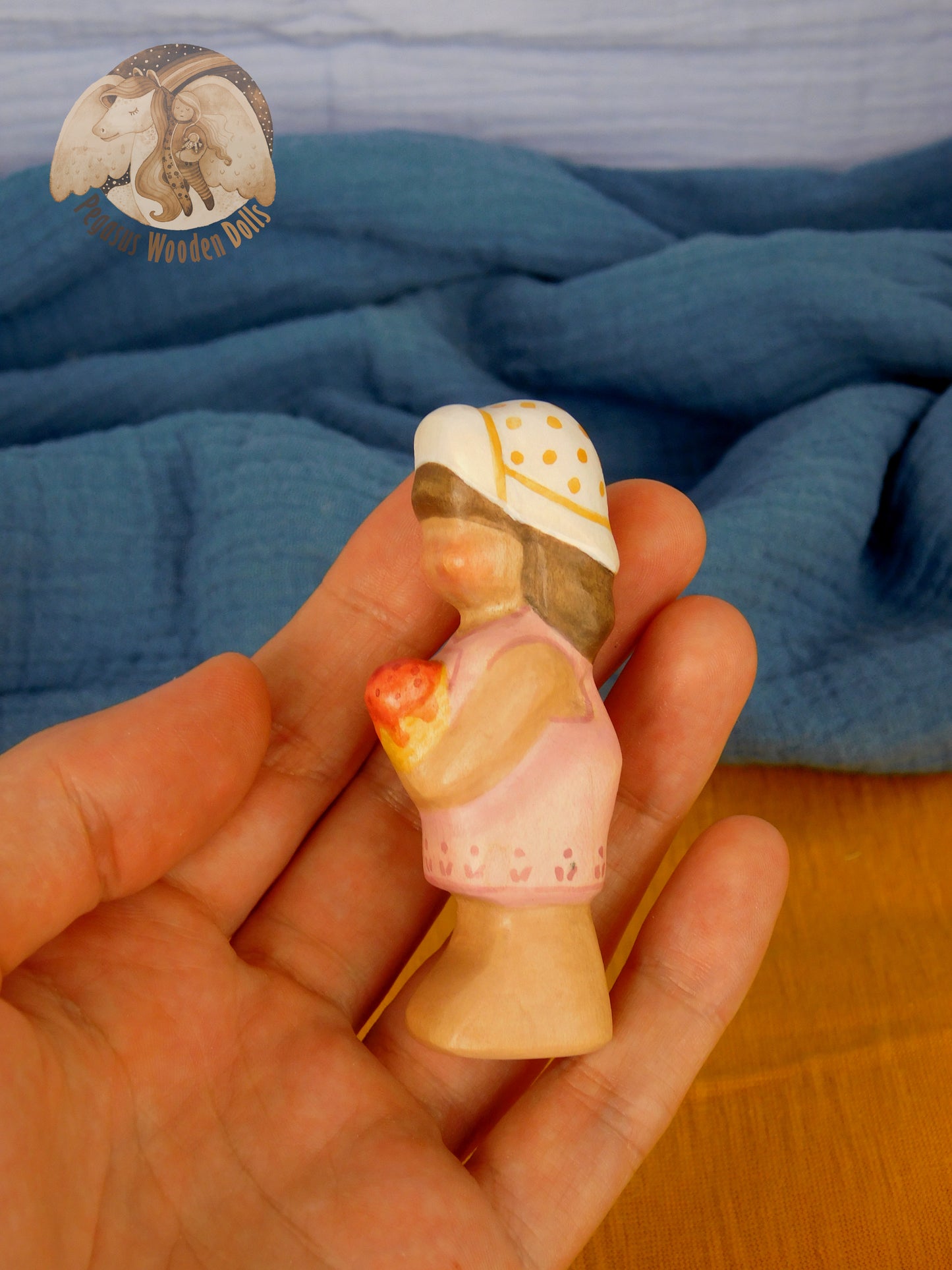 Wooden Standing Baby in pink pants with ice-cream