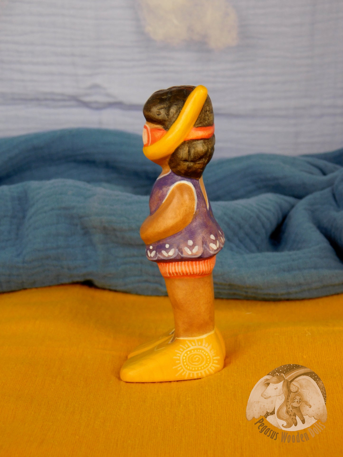 Wooden Snorkelling Girl figure in purple swimming dress
