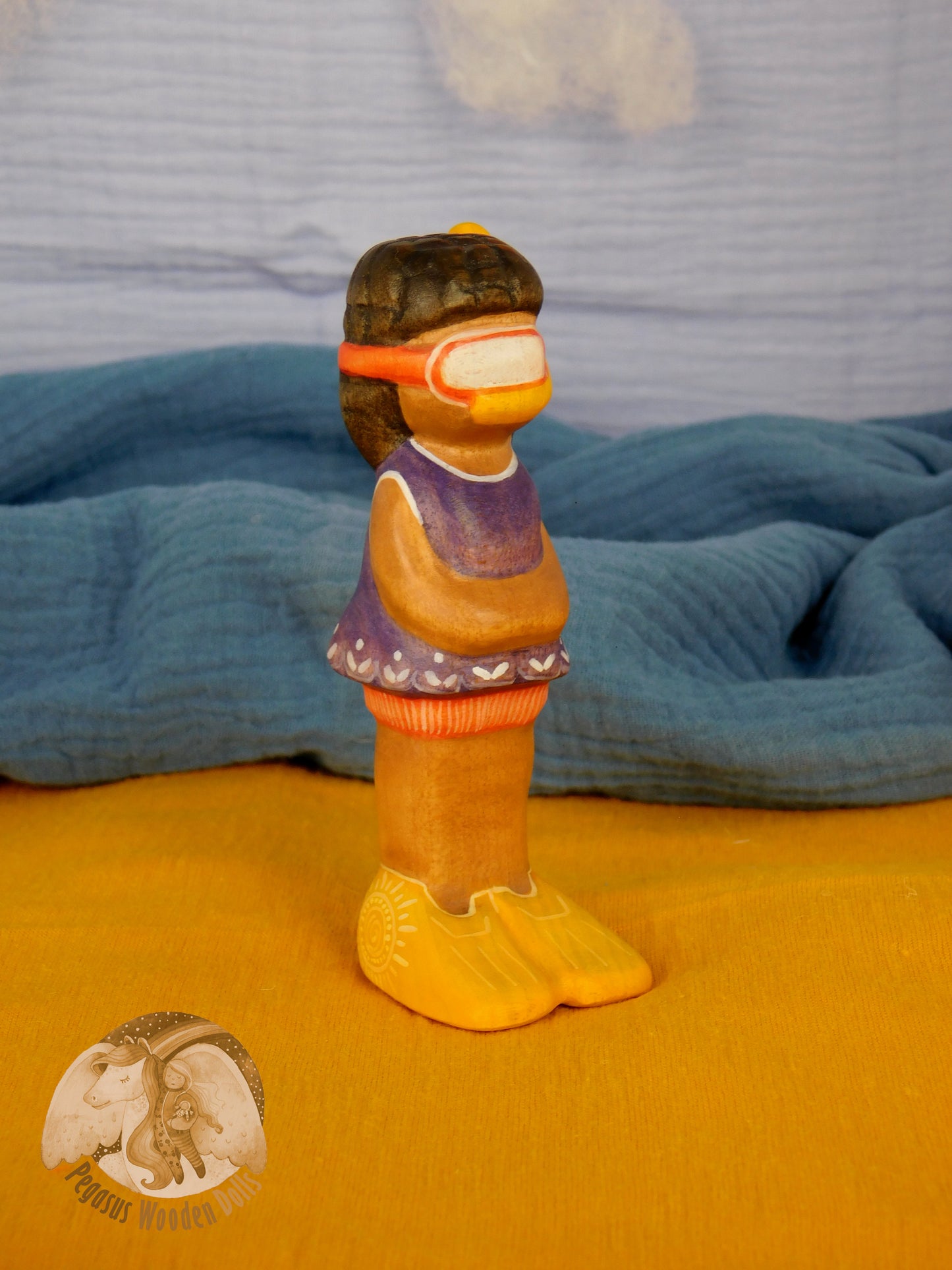 Wooden Snorkelling Girl figure in purple swimming dress