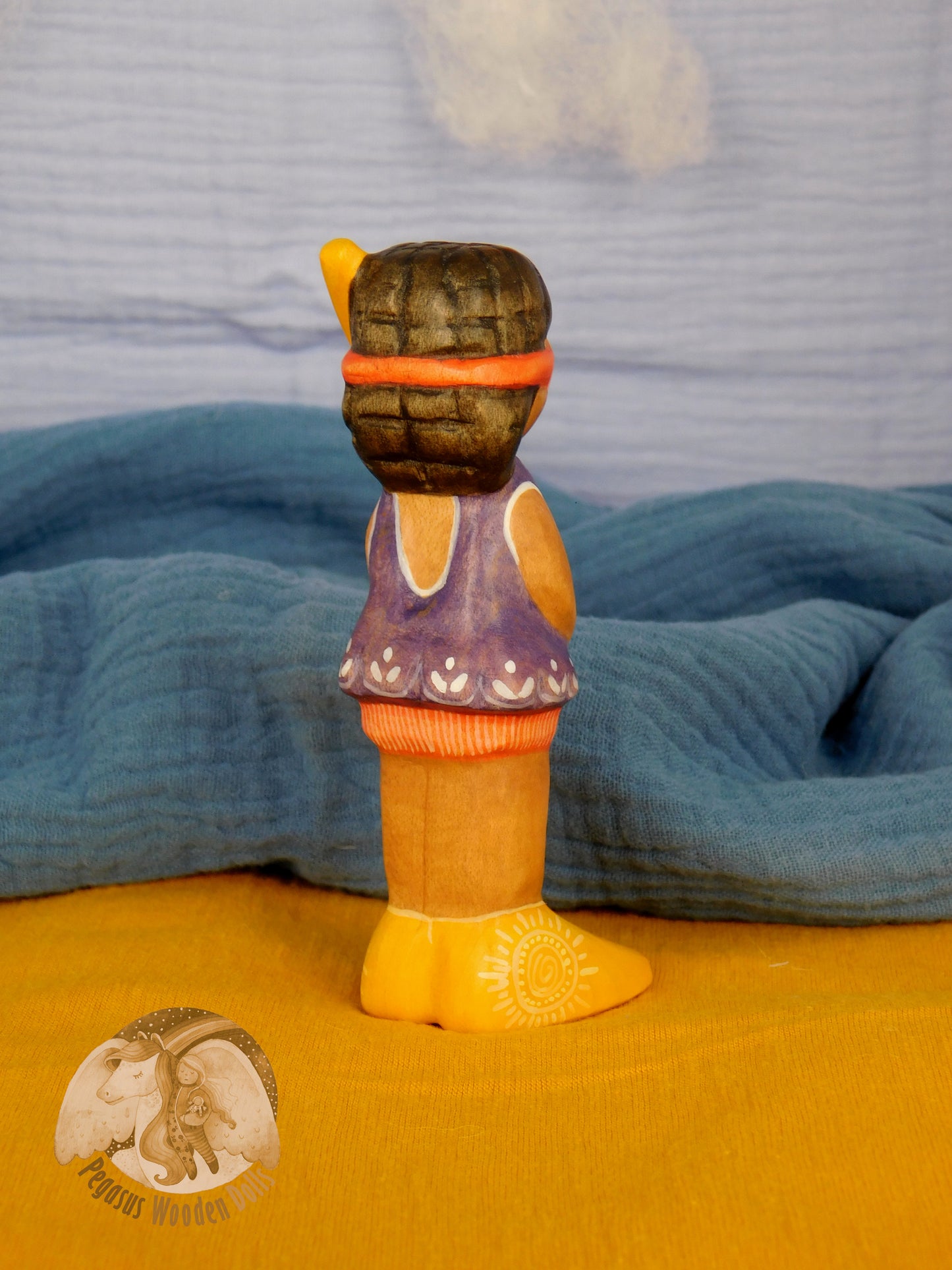 Wooden Snorkelling Girl figure in purple swimming dress
