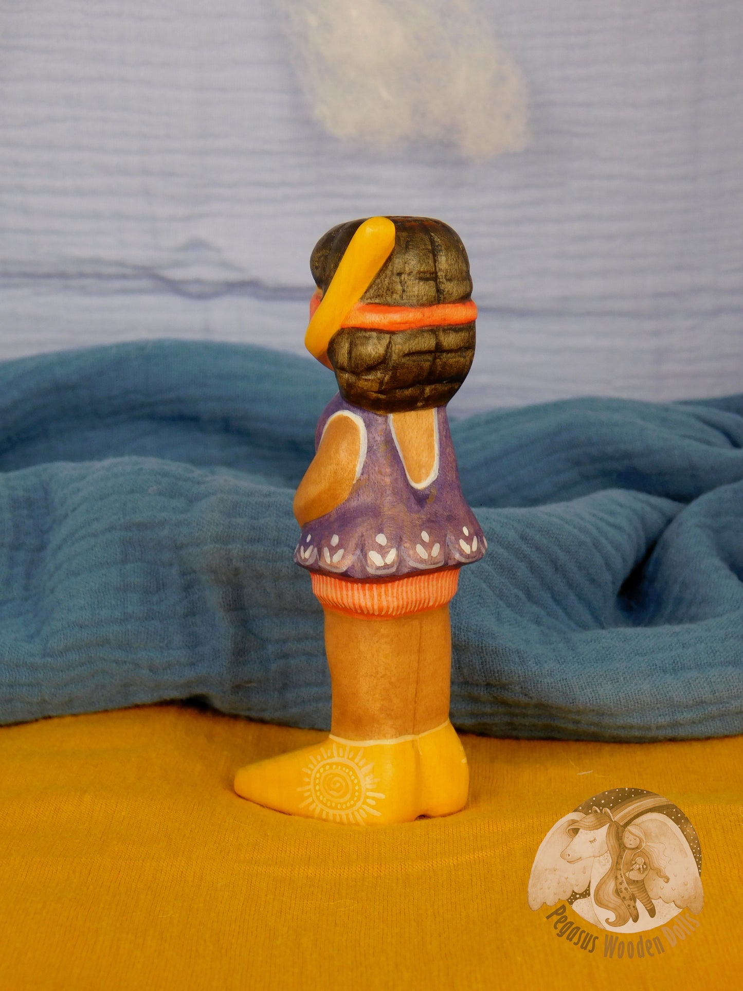 Wooden Snorkelling Girl figure in purple swimming dress