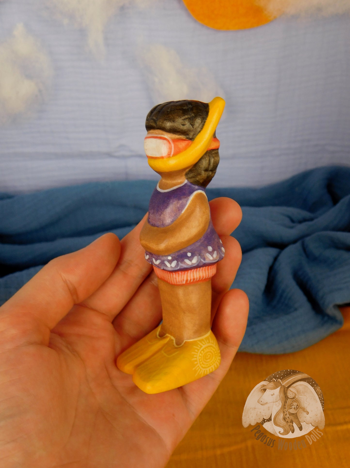 Wooden Snorkelling Girl figure in purple swimming dress